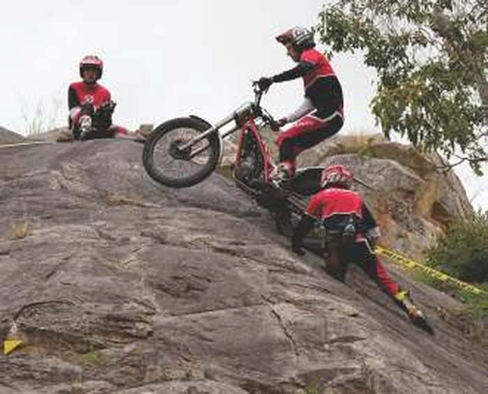 Trials rider on a rock face at Immediate Metals during a 2022 national event