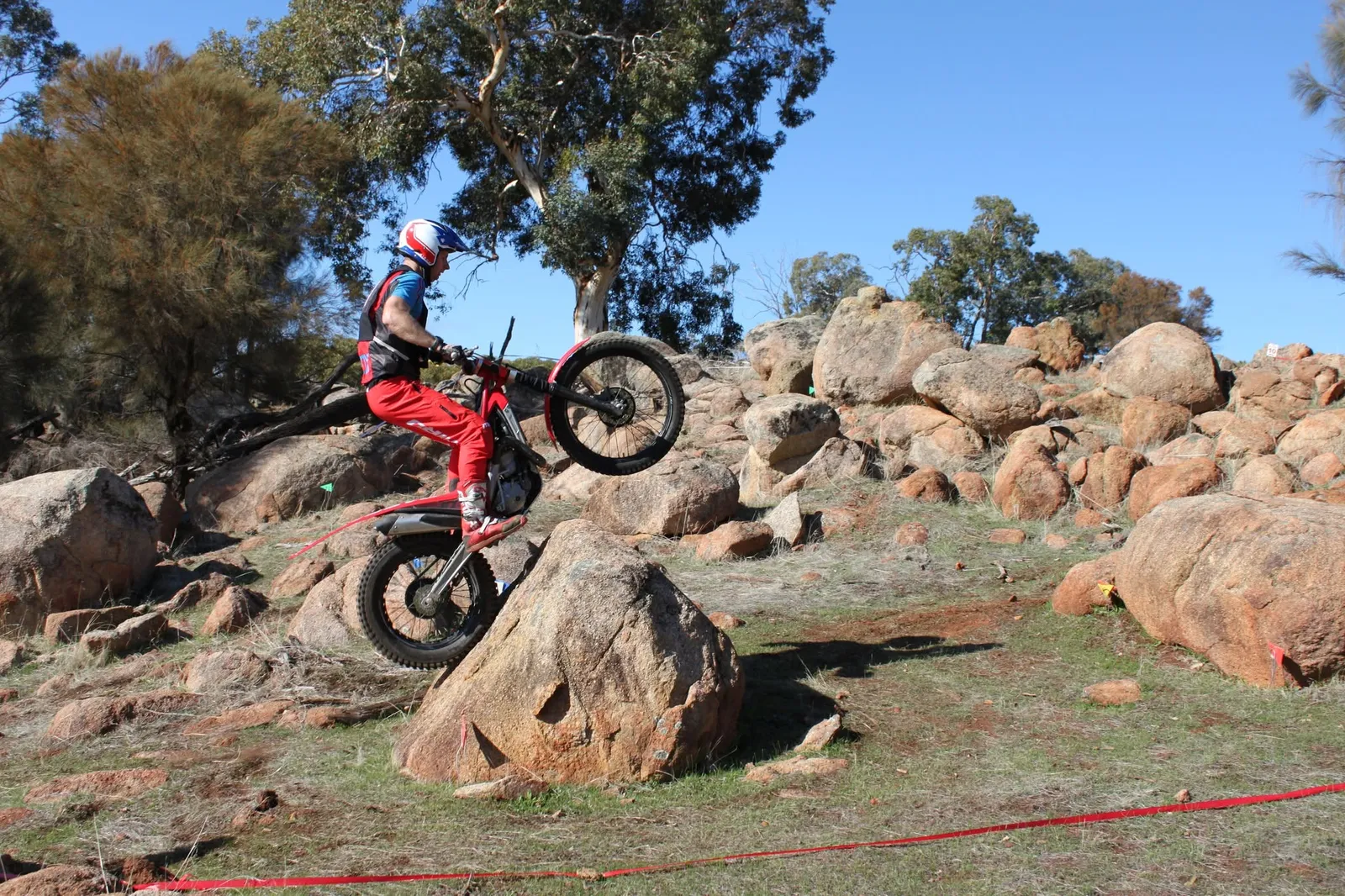 Pathfinders trials rider negotiating a rocky section at a Western Australian event