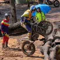 Trials rider climbing a natural rock section at the 2025 WA State Championships