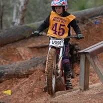Trials rider competing over rocky terrain at the 2025 WA State Championships